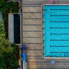 An aerial view of our swimming centre reveals the impressive scale and design of our pools. These shots showcase our clean, organized, and spacious environment, perfect for both training and leisure.