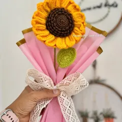 This single large crochet sunflower makes a statement. It's beautifully wrapped and tied with a lace ribbon, creating a thoughtful and impressive gift for someone you love.