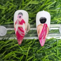 This intricate bridal-themed nail art, featuring a figure in a saree, was created by one of our talented students. It shows their ability to translate complex ideas into miniature art.