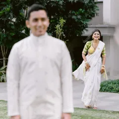 The bride's joyful reaction as she runs towards her groom for their first look. A moment of pure anticipation and happiness.