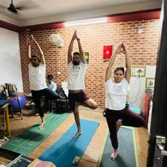 Students holding Vrikshasana (Tree Pose) during our International Yoga Day event. A beautiful display of balance and unity.