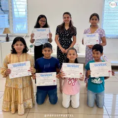 Graduation day. Our students from the "10 days, 10 paintings" course receive their certificates of completion from their instructor.