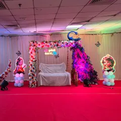 Here is the Sankheda jhula as part of a full stage decoration. You can rent just the jhula or have me create the entire setup for you.