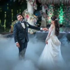 The first dance is always a magical moment. Here, the groom is having a blast, and his energy is just contagious. I love capturing the fun and joy of the wedding reception.