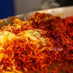 This is the 'keri no chundo', or grated raw mango, that we mix with the stuffed gunda berries. It adds an extra layer of tanginess and texture to the pickle.