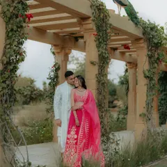 A perfect moment at Suryagarh, Jaisalmer, where a peacock decided to join Kajal and Ram's couple shoot. This unplanned guest added a touch of royal Rajasthani charm to their romantic portrait.