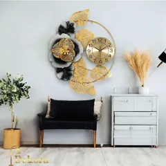 A detailed look at the handcrafted flower clock, showing the layered petals and brushed gold finish that add depth and luxury.