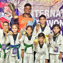 Our young champions proudly display their medals after a successful tournament. Each medal represents countless hours of practice, focus, and the determination to succeed.
