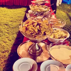 A fresh salad and nacho bar from an outdoor event. I always provide healthy and light options for guests to enjoy alongside the main courses.