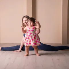 My daughter is my favorite yoga partner. Here she is, making an appearance while I practice Hanumanasana, or the splits. This is the reality of a home practice with a little one, full of joy and unexpected moments.