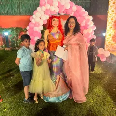 A mermaid character poses for photos with the birthday girl and her family. These live characters are not just for entertainment, they also provide wonderful photo opportunities and memories.
