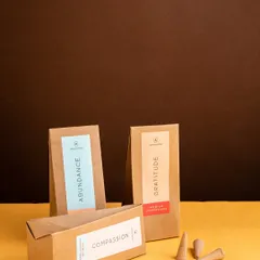 Awaken your senses with the serene aroma of my premium incense cones. This image features cones from my 'Abundance', 'Gratitude', and 'Compassion' collection, perfect for creating a cozy and peaceful atmosphere in your home.