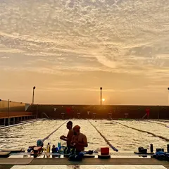 This is the kind of morning that makes you fall in love with swimming all over again. A beautiful sunrise over the pool at our Domlur location, with swimmers already getting their laps in.