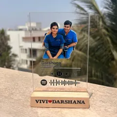A perfect gift for a couple in the medical profession. This Spotify plaque features their photo in their scrubs, their names engraved on the wooden base, and the code to their special song.