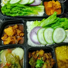 A delicious combination of my scrumptious chicken and pork thalis. You can mix and match options to give your guests a choice of their favorite Manipuri dishes.