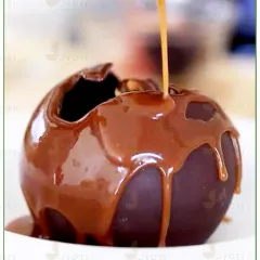 Dessert should be a moment of pure theatre. This melting chocolate sphere reveals a hidden treat as warm caramel is poured over it, offering guests a dramatic and delicious conclusion to their meal.