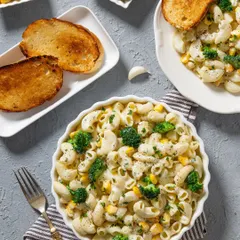 An alternate angle of the white sauce macaroni, providing a different perspective for menu or social media use.