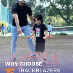 A coach guides one of our youngest athletes over mini-hurdles. This image incapsulates our commitment to cultivating athletes from a young age.