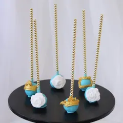To complete the fairytale theme, I created these matching Cinderella cake pops. The set features designs like white chocolate roses, edible gold frames, and miniature crowns, coordinating perfectly with the cupcakes for a complete dessert table.