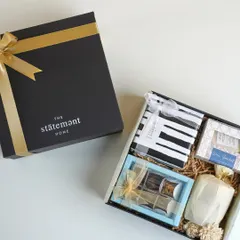 This elegant custom hamper for 'The Statement Home' shows how I can align the gifts with your brand's aesthetic, creating a cohesive and luxurious experience.