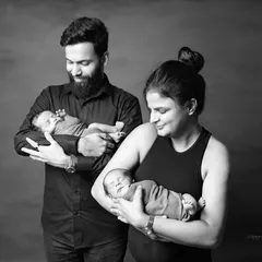 A family portrait of pure love. Welcoming twins is double the blessing, and I love capturing the first moments of a new family of four in a timeless black and white photo.