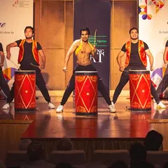 We love bringing unique acts to the stage, like this powerful drumming performance for a corporate event. This high-energy percussion act is a fantastic way to grab the audience's attention and add a different kind of rhythm to your show.