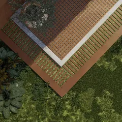 An aerial detail showing the proposed textures for the outdoor flooring, blending seamlessly with the surrounding grass and landscape.