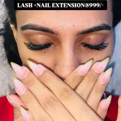 A great example of my nail and lash combo deals. This client got a beautiful set of stiletto nail extensions with glittery gold French tips and a full set of eyelash extensions.