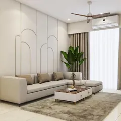 A clean and contemporary living room design featuring an L-shaped sofa and a minimalist coffee table. The wall behind the sofa has a subtle arched paneling design, adding a touch of elegance without overwhelming the space.
