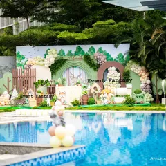 Advaith's woodland theme set up by a beautiful pool. This image shows how I can adapt my magical setups to unique venues, creating a stunning visual contrast between the rustic woods and the sparkling water.