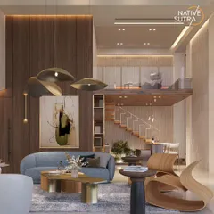 This view highlights the sculptural furniture and a floating mezzanine, demonstrating how we layer different functional zones within a single, cohesive space. The warm wood tones contrast beautifully with the cool concrete, a signature of our modernist designs.