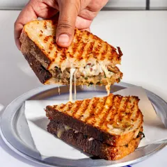 My Cheesy Mushroom Melt Sandwich is the ultimate comfort food. It's made with my signature seeded sourdough and packed with a flavourful mushroom and cheese mix.