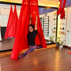 This is my Hanumanasana in the air. The hammock provides the perfect support to work on front splits, helping to align the hips and deepen the posture safely.