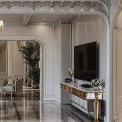 A view of the luxurious classical interior, focusing on the TV console. The ornate gold-legged table, intricate wall moldings, and polished marble floors exude timeless elegance and grandeur.