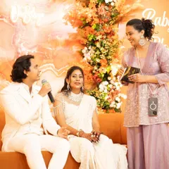 A sweet moment interacting with the parents-to-be at their baby shower. I focus on creating a comfortable and joyous space for them to celebrate their upcoming arrival.