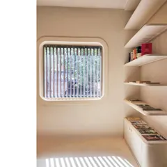 In this media office in Santacruz, Mumbai, a simple moment where design and daylight meet turns the floor into a canvas. The shadow play from the window louvers adds a dynamic, ever-changing pattern to the minimalist, Wabi-sabi inspired interior.