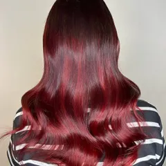 I call this stunning shade Merlot Hair. It's a velvety blend of rich red wine, deep burgundy, and hints of plum. This is a sophisticated and bold color choice that truly makes a statement.