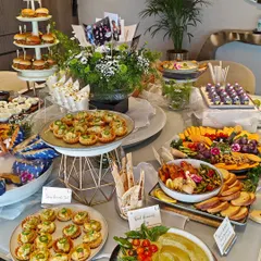 This is what a celebration looks like with Gourmetly Yours. Our grazing tables are a curated journey of flavors, featuring everything from savory tarts and dips to fresh fruits and gourmet cheese platters, ensuring there is a delightful bite for every guest.