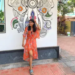 Finding art and color in the streets of Varkala. This beautiful elephant mural was the perfect backdrop for my flowy orange shrug.