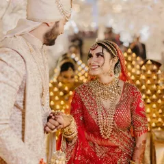 A look of pure love and adoration from the bride to her groom during their wedding ceremony.