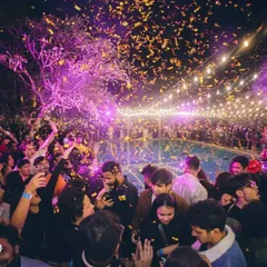 The moment the confetti drops on New Year's Eve at Taj MG Road. This picture captures the pure joy and celebration of a perfectly timed party. I specialize in creating these peak, high-energy moments for any major event.