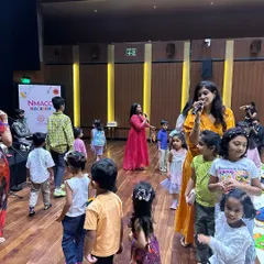 Getting the kids on their feet. Movement and dance are integral parts of our workshops, helping children feel the music in their bodies.