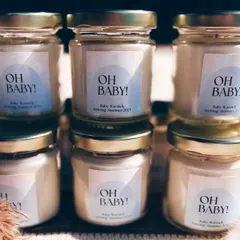 A simple and modern "Oh Baby!" announcement candle. These are a great way to share your exciting news with family and friends, and they are available for under 99 rupees.