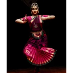 A dynamic pose from a performance at Aikyam 2024. The beauty of Bharatanatyam lies in its ability to be simultaneously strong and graceful, a balance we constantly strive for in our practice.