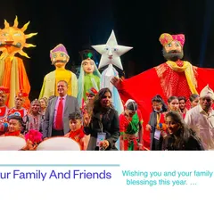 Here you can see some of our giant parade puppets on stage with our full troupe. We create these large-than-life characters, like the sun puppet and the Rajasthani man, from lightweight foam so they are easy to carry during festivals and events.