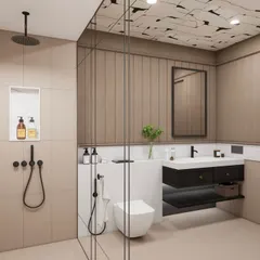 This modern bathroom is a canvas of warm beige tones and bold contrasts. Matte black fixtures, from the rain shower to the taps, provide a sculptural, contemporary edge against the soft, clean backdrop.