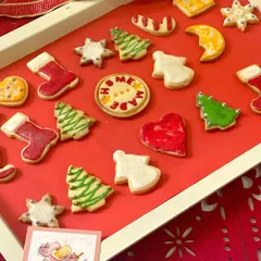 A tray full of our assorted Christmas cookies, ready to be packed into gift boxes. We even made a special round cookie that says "HOME MADE" because that's what we're all about.