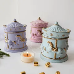 My merry-go-round jars, adorned with liquid gold, are perfect for storing fine jewelry or other trinkets. They can also be filled with a custom-scented candle.