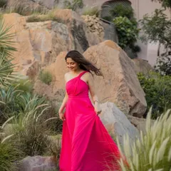 A beautiful solo shot of the bride-to-be during her pre-wedding shoot. The minimal makeup and flowing dress create a look of effortless romance.