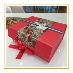 I now offer custom theme-based collapsible boxes. This one has a London theme, perfect for someone studying abroad. Just add your items and your gift is ready.